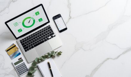 Person checking their credit score for free on a smartphone in 2026