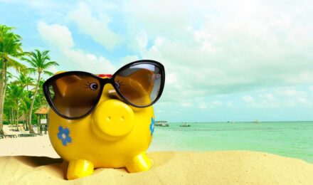 A person using a 52-week savings challenge to plan a vacation
