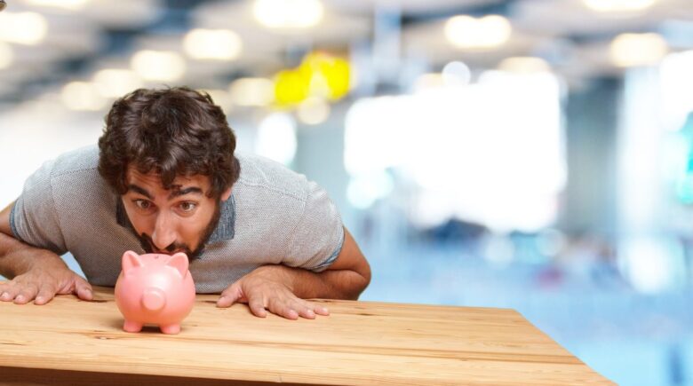 A person using a savings challenge to build an emergency fund