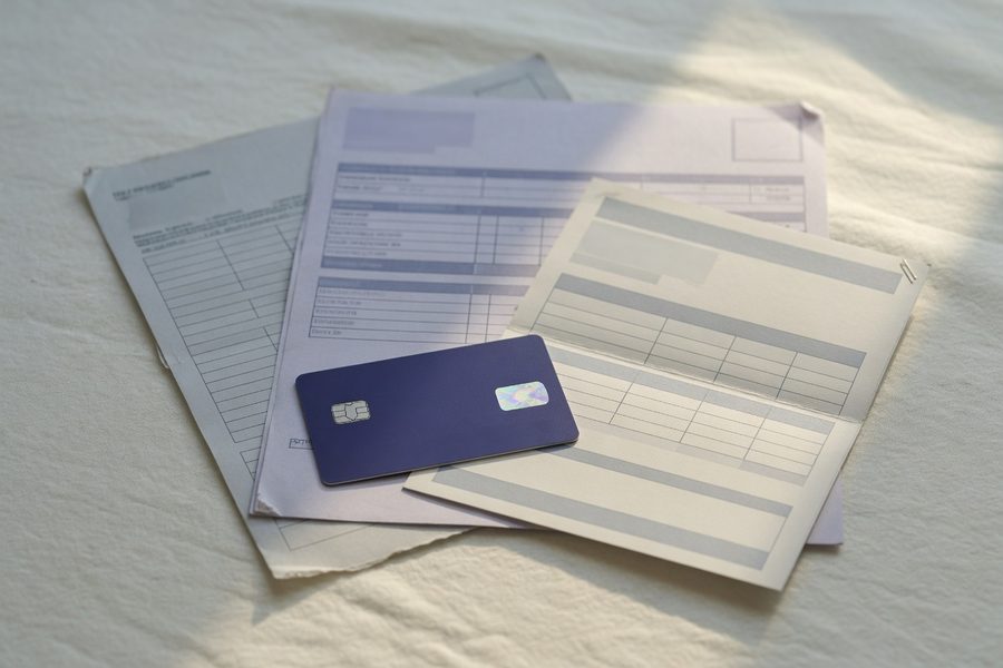 A split screen showing a secured credit card and credit‑builder loan application forms.