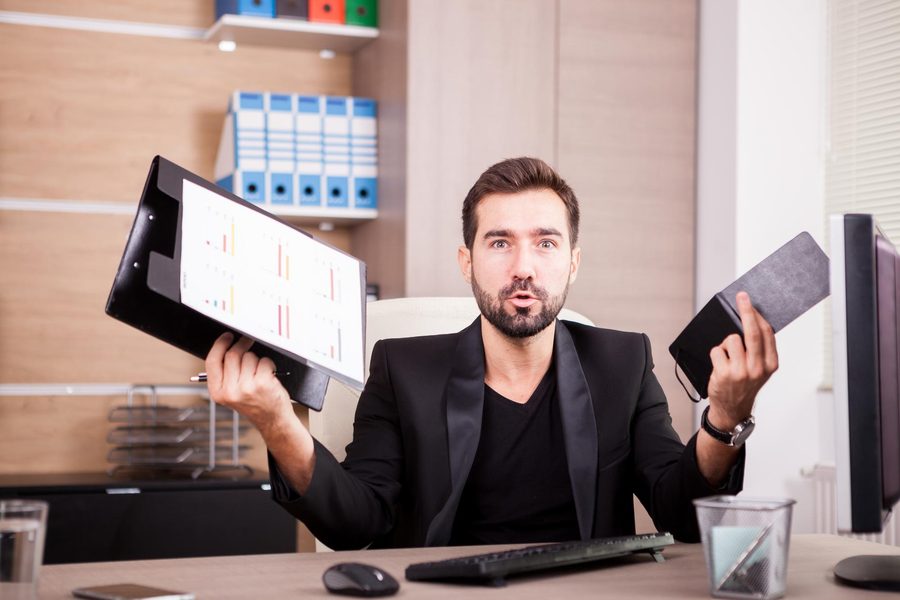 A stack of business formation documents and bank forms