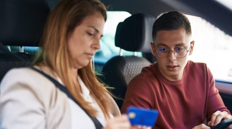 First-time car buyer reviewing auto loan options while monitoring credit score impact
