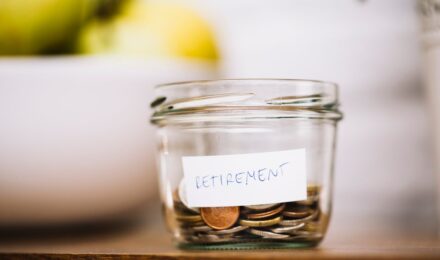 A person looking at a savings goal with a chart showing mental health improvement
