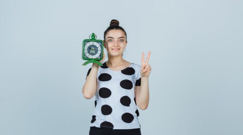 A person using a round-up savings app to automatically save money