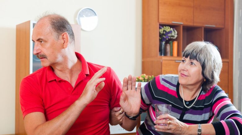 Woman reviewing financial documents and retirement plans at home