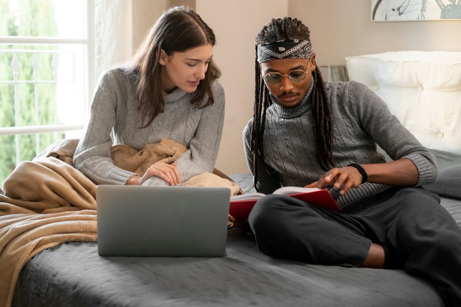 A parent reviewing a 529 plan statement at the kitchen table.