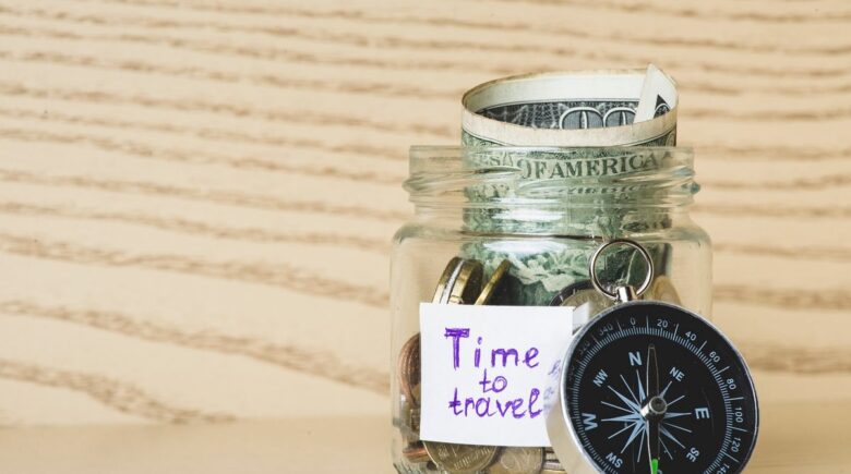 Person planning a sabbatical with a savings roadmap and calculator on a desk